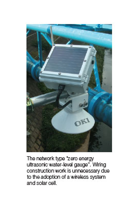 Photo of the network type zero energy ultrasonic water-level guage. Wiring construction work is unnecessary due to the adoption of a wireless system and solar cell.